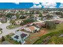 Aerial view of the house and its location within a residential neighborhood at 1439 Strada D Argento, Venice, FL 34292