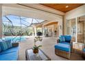Inviting pool and spa area with screened enclosure at 793 Vanderbilt Dr, Nokomis, FL 34275