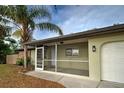 Screened porch with access to front door and garage at 554 Everest Rd, Venice, FL 34293