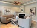 Inviting living room with neutral tones, fireplace, and stylish decor at 6405 Gulf Dr, Holmes Beach, FL 34217