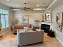 Inviting living room with neutral tones, fireplace, and stylish decor at 6405 Gulf Dr, Holmes Beach, FL 34217