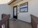 Condo entry with private balcony and welcome mat at 694 Bird Bay W Dr # 137, Venice, FL 34285