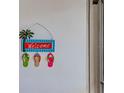 Welcoming entry with beach-themed decor at 537 Manatee Ct # 204, Venice, FL 34285