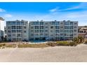 Multi-level condo building near beach with pool at 950 Tarpon Center Dr # 202, Venice, FL 34285