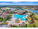 Community boasts resort-style pool, tennis courts, and scenic lake views at 20428 Lagente Cir, Venice, FL 34293