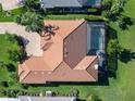 Top-down view of home showcasing a large pool and patio at 535 Westmount Ln, Venice, FL 34293