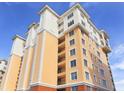 Condo building exterior, showcasing balconies, windows and architectural details at 157 Tampa E Ave # 807, Venice, FL 34285