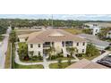 Top-down view of condo building and surrounding area at 200 Gardens Edge Dr # 223, Venice, FL 34285