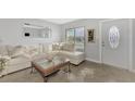Light and airy living room featuring a comfy sectional sofa at 13540 Dibella Ave, Port Charlotte, FL 33981