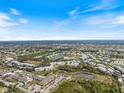 Wide aerial view of community, showcasing the neighborhood and surrounding landscape at 2081 Willow Hammock Cir # F204, Punta Gorda, FL 33983