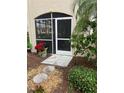 Private screened patio with access from the condo unit at 7000 Ibis Way # 101, Venice, FL 34292