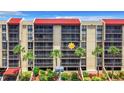 Condo building aerial view, red roof at 21405 Olean Blvd # 404, Port Charlotte, FL 33952