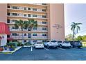 Building exterior with parking and landscaping at 244 Saint Augustine Ave # 104, Venice, FL 34285