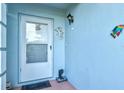 White front door with glass panel and decorative accents at 452 Wexford Cir # 105, Venice, FL 34293