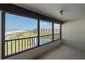 Balcony with stunning views of the beach, pool, and ocean at 5790 Midnight Pass Rd # 602, Sarasota, FL 34242