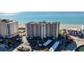 Seaside condominium displaying extensive damage from a storm, and showing construction and renovation at 840 The Esplanade N # 104, Venice, FL 34285