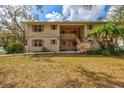 Charming two-story condo featuring neutral siding, shutters and a well-maintained lawn at 1051 Forrest Nelson Blvd # A-103, Port Charlotte, FL 33952