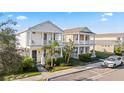 Beautiful two-story homes showcasing well-maintained landscaping in a peaceful neighborhood at 12679 Sagewood Dr, Venice, FL 34293