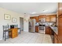 A kitchen featuring stainless steel appliances, granite countertops and ample cabinet storage at 2983 Greendale Rd, North Port, FL 34287