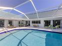 Sparkling pool area with ample seating for relaxation and entertaining at 601 Apalachicola Rd, Venice, FL 34285