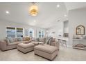 Large living room features a sectional sofa, and is open to the kitchen and dining areas for easy entertaining at 1087 Piedmont Rd, Venice, FL 34293