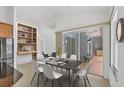 Dining area with views to the lanai at 15688 Melport Cir, Port Charlotte, FL 33981