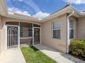 Inviting screened patio with white trim, providing a cozy and pest-free outdoor living space at 4123 Cascade Falls Dr, Sarasota, FL 34243