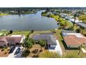 Aerial shot showcasing the home's proximity to the tranquil waters and the waterfront neighborhood at 4740 Payne St, North Port, FL 34287