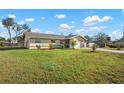 Attractive single-story home boasts well-maintained front yard and attached one car garage at 308 Purdue Rd, Venice, FL 34293