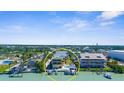 Waterfront condo with boat dock offers serene coastal living and direct access to the open water at 109 Bayshore Rd # 10, Nokomis, FL 34275