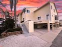 Charming elevated beach property with spacious covered parking and attractive exterior features at 109 Bayshore Rd # 10, Nokomis, FL 34275