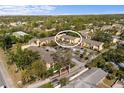 Aerial view showcasing the condo community's layout and surrounding green space at 3417 Clark Rd # 217, Sarasota, FL 34231