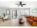 Open-concept living room showcasing natural light and an inviting atmosphere at 6157 Midnight Pass Rd # D31, Sarasota, FL 34242