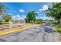 Welcome to Heron Lakes, featuring lush landscaping and a serene neighborhood setting at 3008 Sail Pointe Cir # 2C, Venice, FL 34293