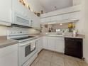 The kitchen has modern appliances, plenty of counter space, and opens to the living area at 432 Sunset Lake Blvd # 205, Venice, FL 34292