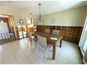 Dining room showcasing a dining table and chairs plus tile floor at 926 Inlet Cir, Venice, FL 34285
