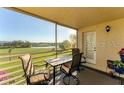 Enjoy the outdoors on this screened balcony that is large enough to accommodate a table and chairs at 934 Wexford Blvd # 934, Venice, FL 34293