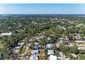 Aerial view of a neighborhood featuring lush greenery and well-maintained homes at 2641 Hyde Park St, Sarasota, FL 34239