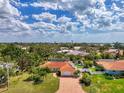 Beautiful neighborhood with mature landscaping, tile roofs, and private pools at 403 Picasso Dr, Nokomis, FL 34275