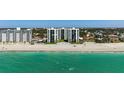 Scenic view of beachfront condos with easy access to the sandy beach and ocean at 627 Alhambra Rd # 1103, Venice, FL 34285