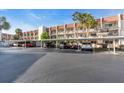 Beautiful condo building featuring assigned covered parking, lush landscaping and is walking distance to the beach at 250 Santa Maria St # 216, Venice, FL 34285
