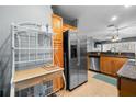 Functional kitchen with stainless steel appliances, granite countertops, and ample storage at 8405 Placida Rd # 206, Placida, FL 33946