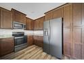 Modern kitchen with stainless steel appliances, granite countertops, and ample cabinet space at 172 Berthoud St, Port Charlotte, FL 33953