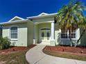 Close-up of the front entrance, highlighting the architectural details and covered entry at 4062 Green Tree Ave, Sarasota, FL 34233