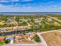 Sprawling community featuring waterfront homes, lush trees, and easy access to nearby highways and bridges at 13648 Clara Ln, Port Charlotte, FL 33981