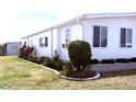 This cozy home features immaculate landscaping and a well-maintained yard at 175 Palm Harbor Dr, North Port, FL 34287