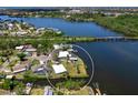 Wonderful waterfront property with a dock and easy access to a bay, the perfect location for boating enthusiasts at 214 Pompano Ln, Nokomis, FL 34275