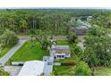 Aerial view of the home and neighborhood showing proximity to natural surroundings at 5106 S Lockwood Ridge Rd, Sarasota, FL 34231