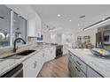 Spacious kitchen featuring granite countertops, modern appliances, and an open floor plan at 4532 Chase Oaks Dr, Sarasota, FL 34241