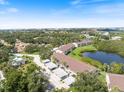 Beautiful aerial view of the condo complex, showcasing the lush landscaping and community amenities at 821 Waterside Dr # 205, Venice, FL 34285